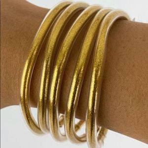 All weather bracelets in gold